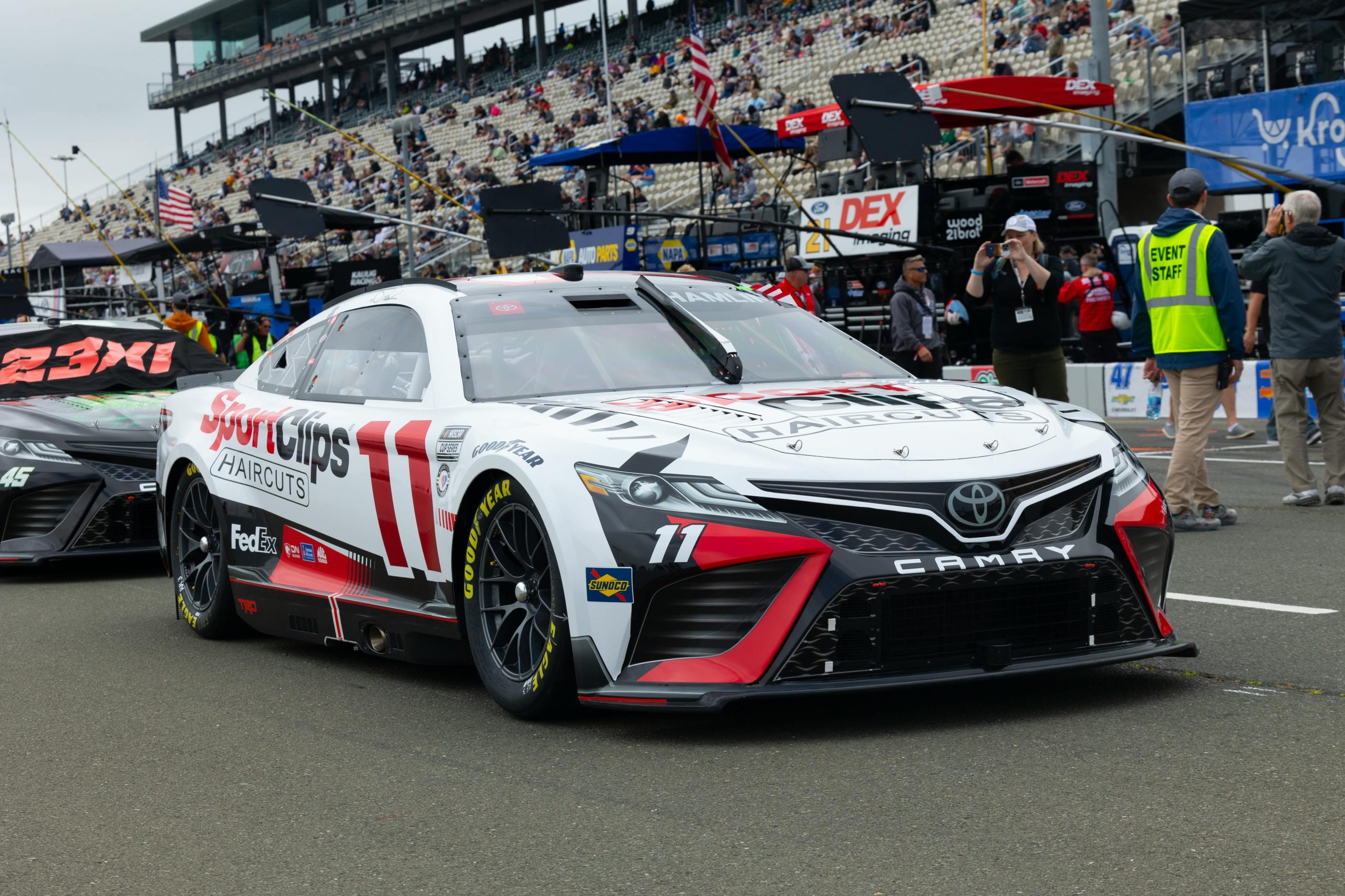 two race cars lined up before a racing event begins